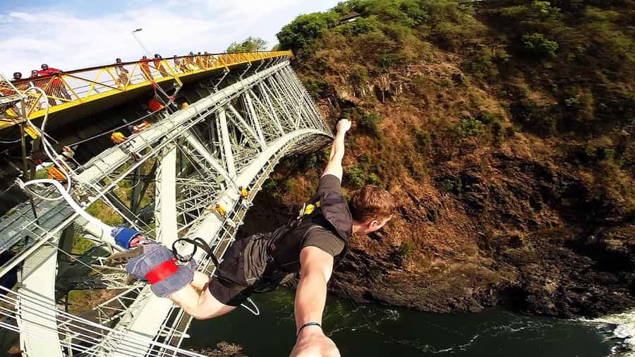 Airport PickUp & Vic Falls Bridge Bungee jumping - Crossing the historic Victoria Falls Bridge