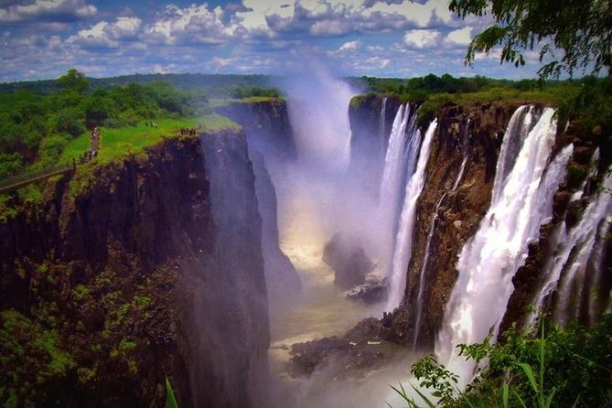 Full Day Victoria Falls incl lunch & Devils Pool 10h ZIMBABWEAN & ZAMBIAN SIDE - Starting at 8:00 With the Zimbabwean Rainforest