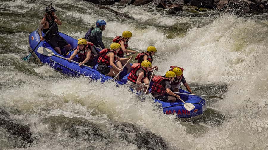 Full Day White Water Rafting Tour - Breaks, lunch, photos, and the long river day