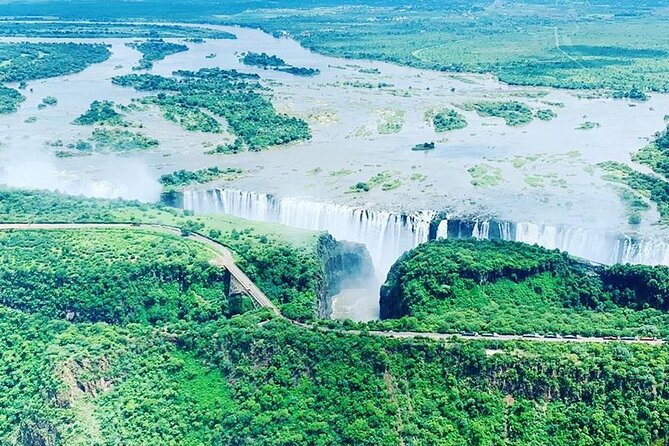 Guided Tour Of The Majestic Victoria Falls/Sunrise Tour - The Big Tree Stop Adds A Second Photo Moment