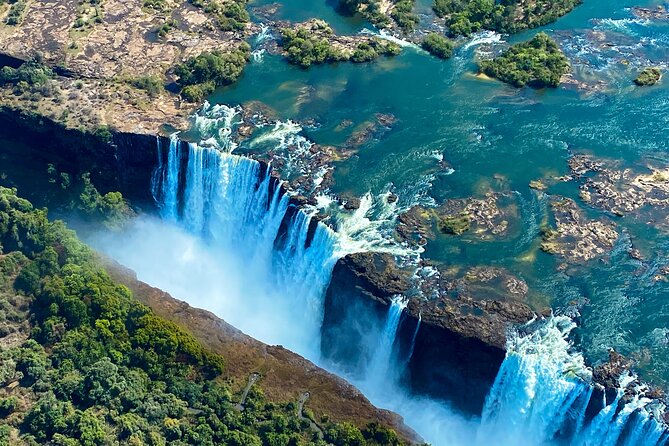 Helicopter Flight Experience Over Victoria Falls - Pickup, the helipad, and the first hour