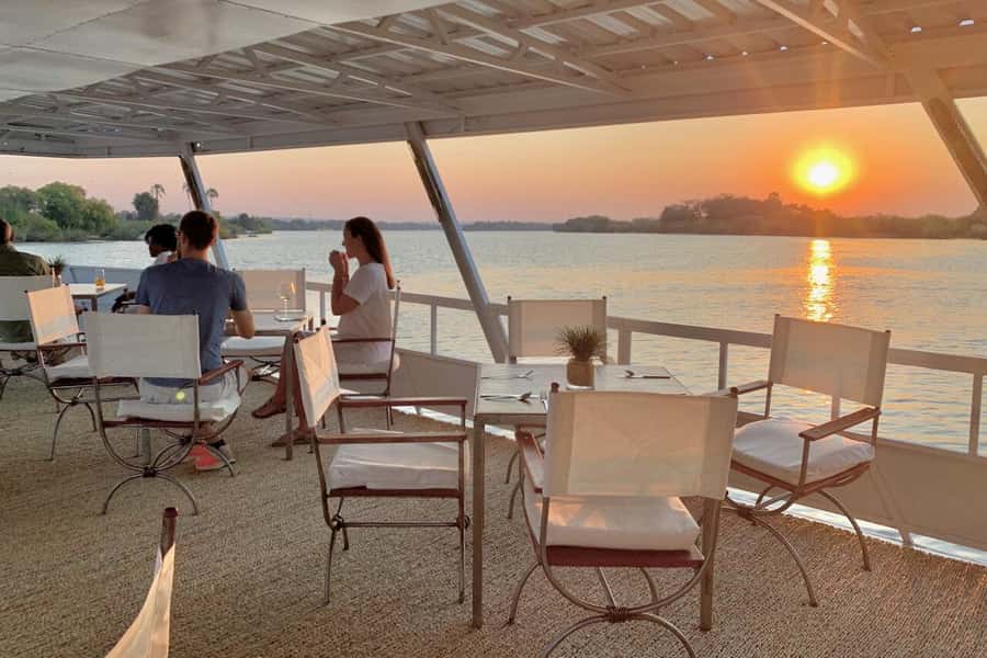 Luxury Cruise : Sunset Boat Cruise on The Zambezi Explorer - Following the river past islands and wildlife areas