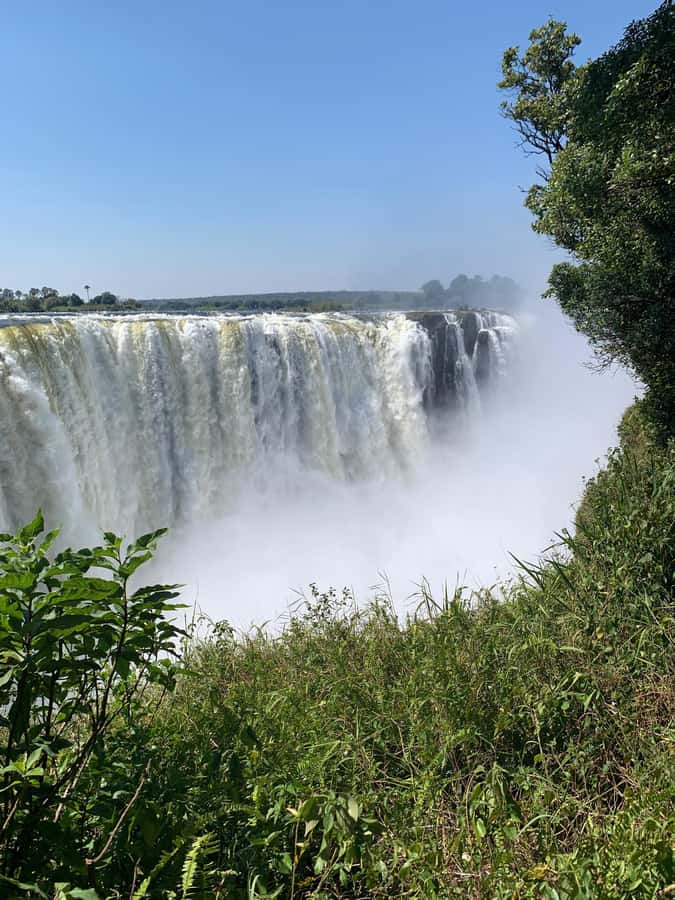 Victoria Falls: Guided Tour of Falls Zimbabwe & Zambia combo - Entering Victoria Falls National Park
