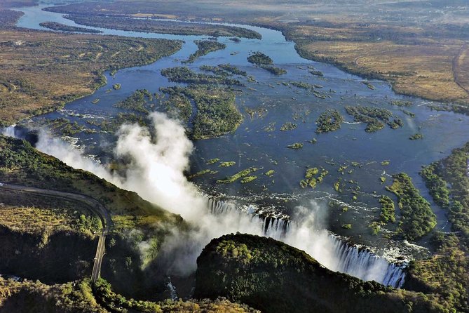 Victoria Falls Guided Tour with Hotel Pickup - Pickup, vehicle, and timing