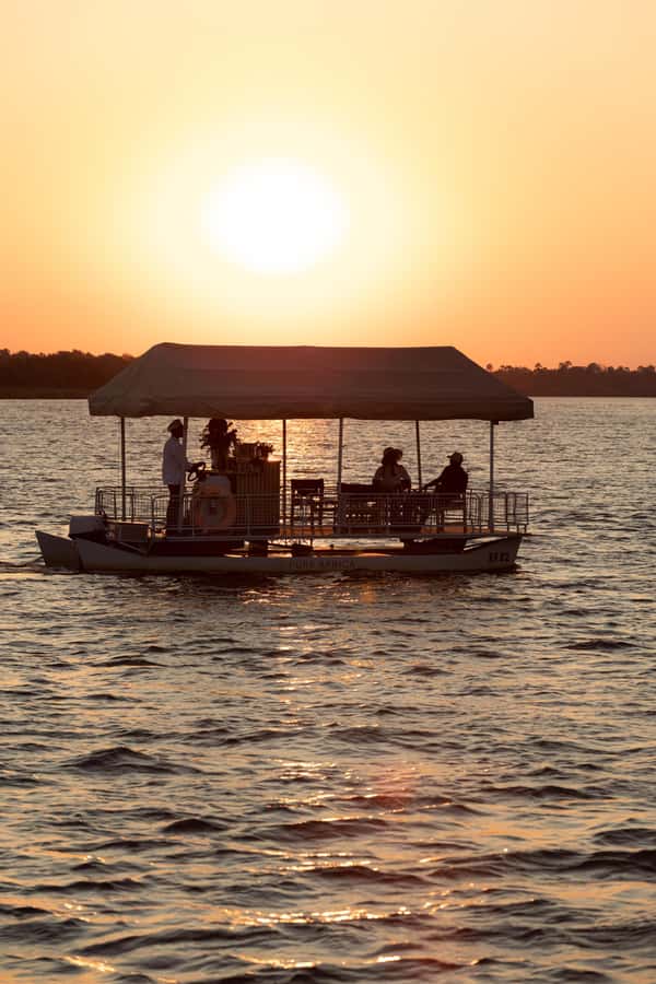 Victoria Falls: Private Sunset Cruise on the Zambezi River - Hotel pickup and the Zimbabwe-Zambia border detail