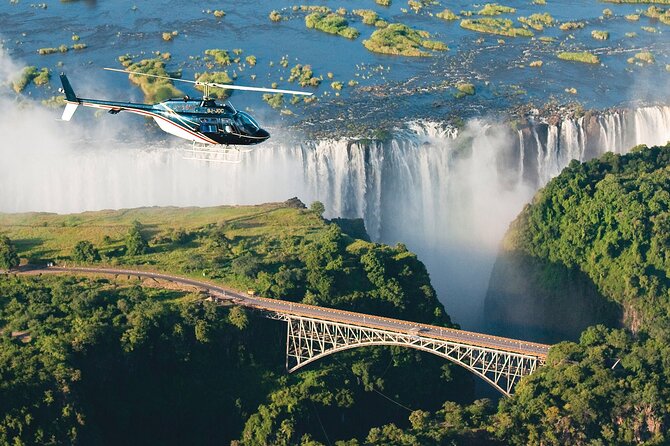 Victoria Falls : Scenic Day Tour, Lunch & Helicopter Flight - The morning begins with pickup and a private group